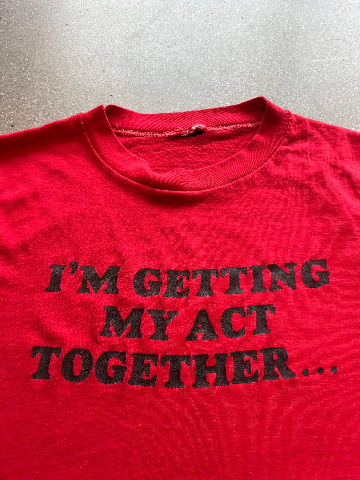80’S RED “I’M GETTING MY ACT TOGETHER…” TEE - S