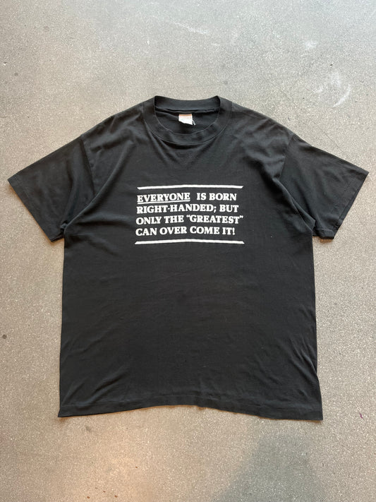 90’S RIGHT HANDED “ONLY THE GREATEST CAN OVER COME IT!” TEE - L