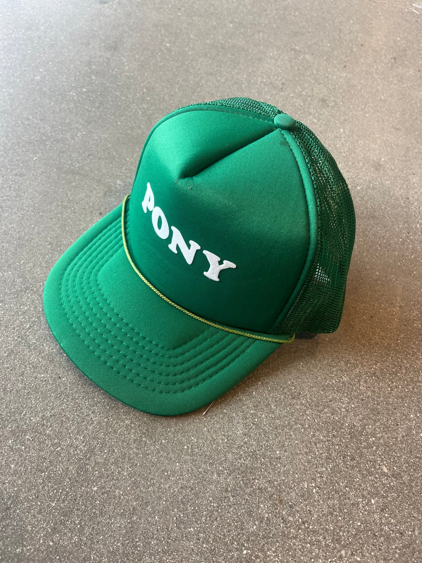 90’S GREEN “PONY” HAT - ONE SIZE