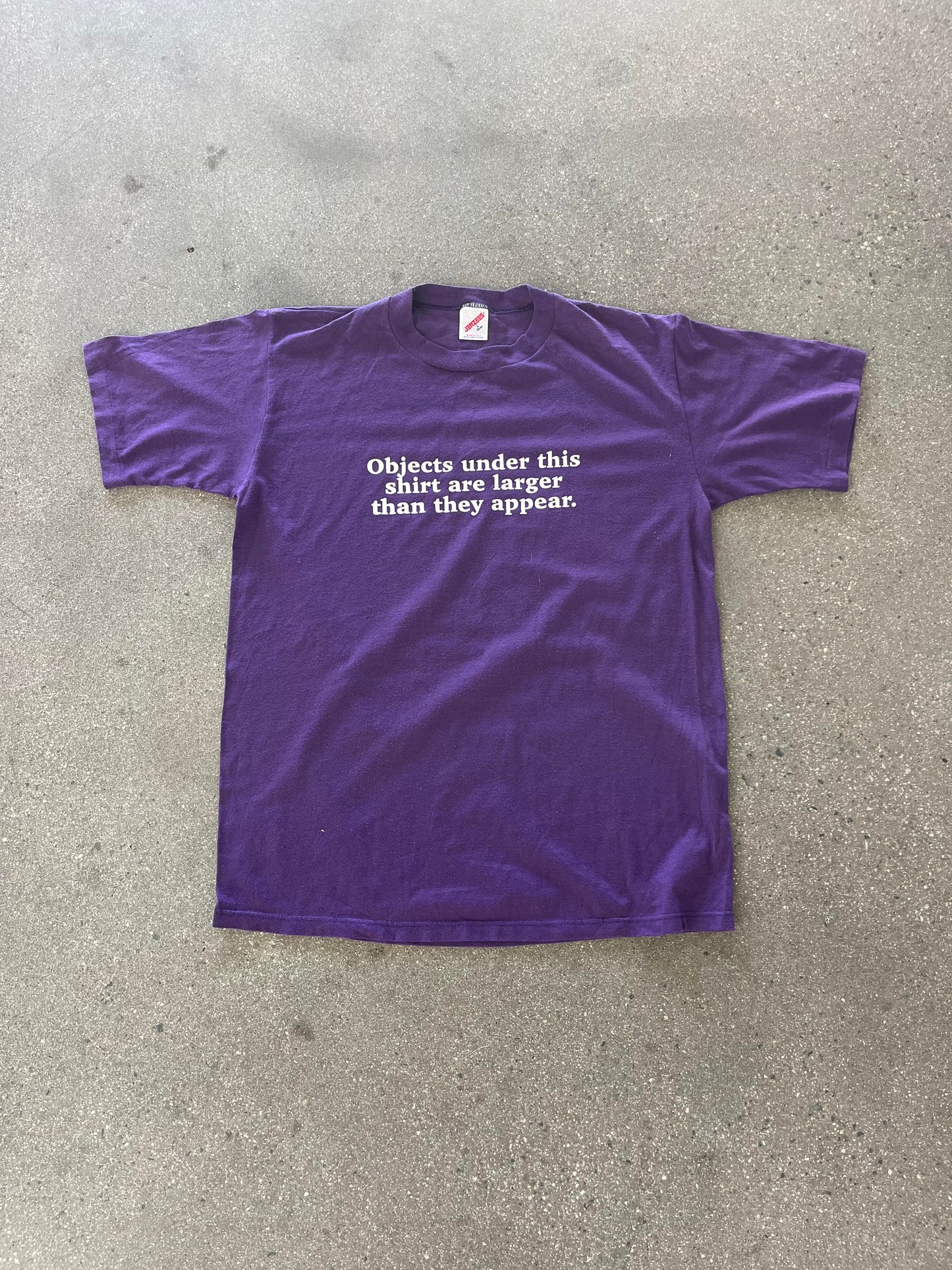 90'S "OBJECTS UNDER THIS SHIRT ARE LARGER THAN THEY APPEAR" - L