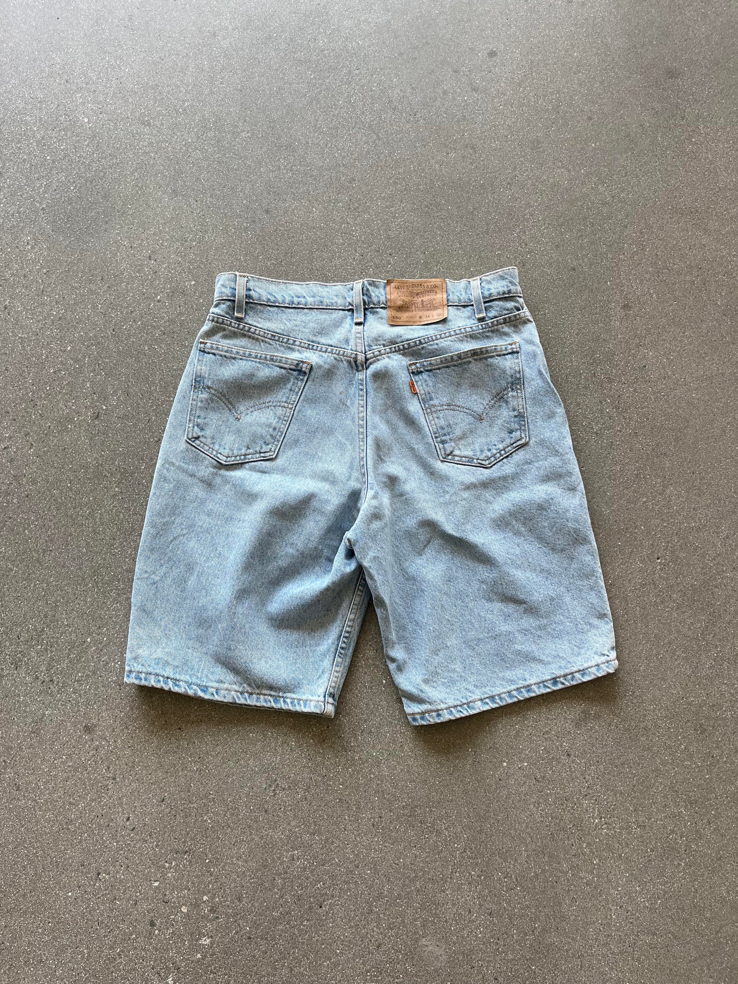 90'S ORANGE TAB LEVI'S 550 JORTS - 34